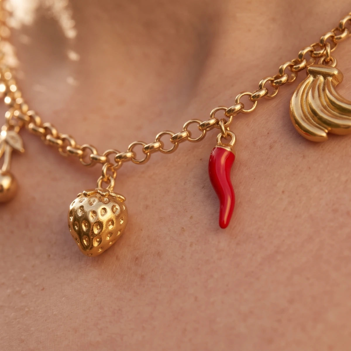 Kloreys stainless steel necklace with 5 charms and red accents