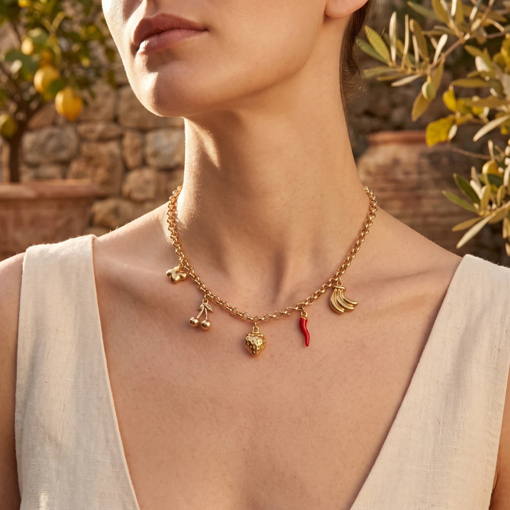 Kloreys stainless steel necklace with 5 charms and red accents