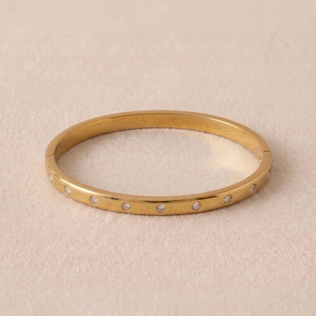 Pulsera Rígida Dorada Lisa Circonitas